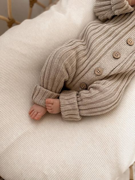 A stylish ultra-soft long-sleeve basic chunky ribbed jumpsuit is everything you need. Your little one will be cozy and warm this fall and winter! In an earthy tone and made from ultra-soft cotton, your little one will look Instagram-ready! Designed to be a relaxed oversized fit. Made from a luxurious soft 100% cotton Authentic Little B's Designed In Australia Cuffed Neckline Optional cuffs on sleeves. 4 wood buttons with placket Sizing Guide: Newborn: Up to 4kg 0-3M: 4-6kg 3-6M: 6-8kg 6-12M: 8-1 Ribbed Romper, Toddler Romper, Newborn Romper, Baby Jumpsuit, Knitted Romper, Cute Rompers, Pregnancy Gifts, Bubble Romper, Basic Long Sleeve