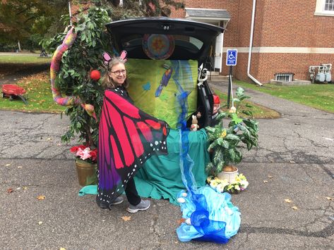 Trunk or Treat-Garden of Eden with butterfly costume. Notice large tie-dye snake! Butterfly Garden Trunk Or Treat, Trunk Or Treat Garden Theme, Flower Garden Trunk Or Treat, Butterfly Trunk Or Treat, Garden Trunk Or Treat, Garden Of Eden Theme, Outfit Images, Butterfly Costume, Fall Fest