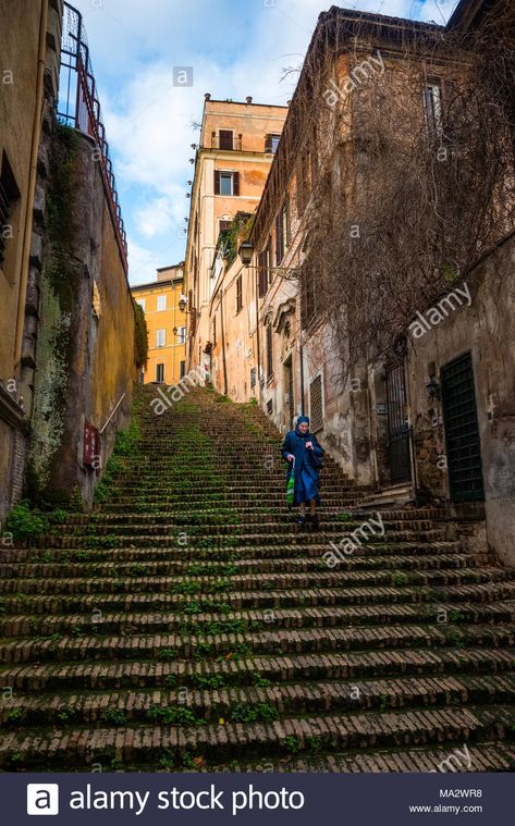 Download this stock image: A nun on Via di Sant'Onofrio which becomes a steep stairway giving a shortcut up to  Janiculum Hill in Trastevere for views of Rome. Lazio. Italy. - MA2WR8 from Alamy's library of millions of high resolution stock photos, illustrations and vectors. Lazio Italy, Killing Eve, Crete, Stock Photography, Rome, Resolution, How To Become, High Resolution, Stock Images