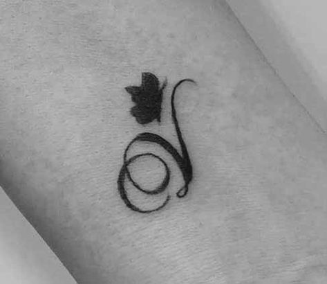 Lovely V Letter Tattoo With A Butterfly V Tattoo Ideas, V Letter Tattoo, Moon And Stars Tattoo, Letter Tattoos, V Tattoo, Stars Tattoo, Letter Tattoo, V Letter, March 2024