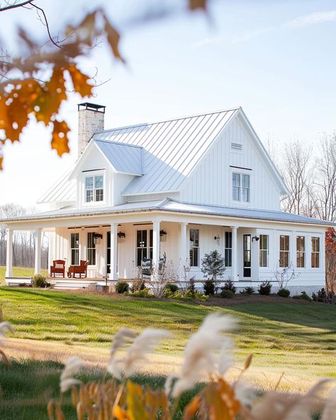 White Metal Farmhouse Exterior, Rustic Farmhouse With Wrap Around Porch, Farmhouse Style Architecture, Restored Farmhouse Exterior, Modern Farmhouse Metal Roof, White Siding Farmhouse Exterior, White Farmhouse Metal Roof, White House Silver Metal Roof, New Build Farmhouse