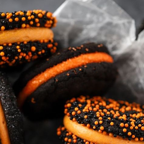 Rachael Ng on Instagram: "Our favorite black cocoa Halloween cookies with a buttercream “sandwich” upgrade 🦇🧡👻

NEW to the blog! Link is in my bio @sugaredandstirred

https://sugaredandstirred.com/halloween-black-cocoa-sandwich-cookies/

#halloweenbaking #cookiefriday #halloweencookies #dairyfreerecipes #sugaredandstirred #dairyfreecookies" Halloween Sandwich Cookies, Black Cocoa Halloween Cookies, Sugar Cookie Oreo Brownie Halloween, Sprinkle Cookies Halloween, Spooky Stuffed S’mores Cookies, Dairy Free Cookies, Halloween Baking, Cookie Cups, Halloween Cookies