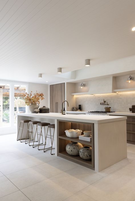 Kitchen with island bench. Neutral colours.