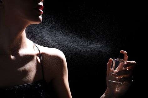 Woman spraying luxury perfume on black background, closeup Perfume Background, Sapphire Ring Designs, Spraying Perfume, Perfume Photography, Dark Theme, Flyer And Poster Design, Year 3, Luxury Perfume, Perfume Brands