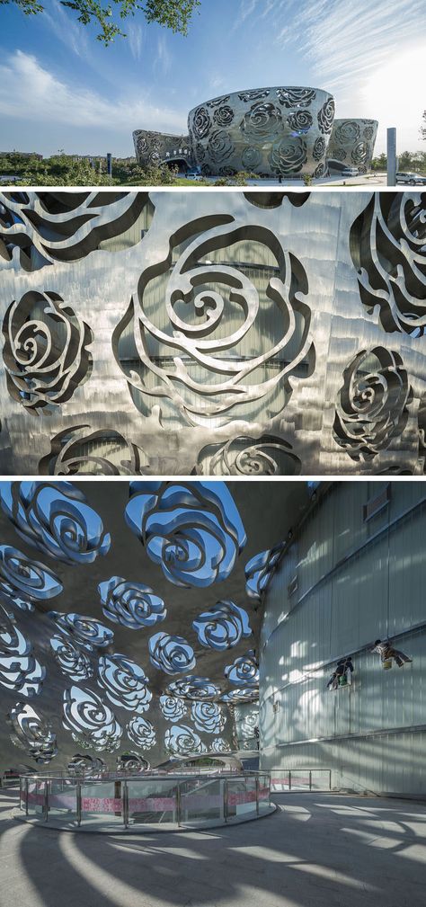 The world's first Rose Museum has opened in Beijing, China, and it's covered by a stainless steel facade that measures in at 984 ft (300m) long and 55ft (17m) high and is perforated by a rose-shaped pattern. Stainless Steel Facade, Steel Facade, Architecture Geometric, Unusual Architecture, Metal Facade, Facade Lighting, One Rose, Unique Buildings, Design Exterior