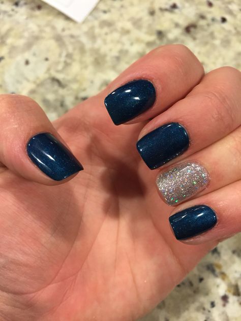 Dark blue and glitter gel nails Navy And Silver Glitter Nails, Dark Blue And Silver Sparkle Nails, Dark Blue Manicure Ideas, Navy Blue Fingernails, Dark Blue Nails With Accent Nail, Navy Blue And Silver Gel Nails, Dark Blue Gel Nails Design, Navy Bridal Nails, Navy Blue And Silver Nails Short