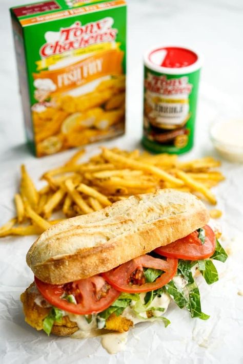 Fish Po' Boy sandwich with fries, Tony Chachere's seasonings in the background Poboy Sandwich Recipe, Sandwich With Fries, Po Boy Sandwich, American Test Kitchen, Sandwhich Recipes, New Orleans Style, Cajun Dishes, Popular Appetizers, Cajun Creole Recipes