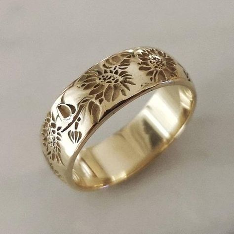 Sunflower ring, elegant and unique 14k gold wedding ring, unique gold wedding ring for the stylish bride to be.* Band width: 6 mm* Thickness: 1.2 mm* Available in 14K or 18K YELLOW, WHITE and ROSE gold.   The price listed is for 14K please contact me for 18K pricing.* Sizes vary from 5 US to 8 US, including half sizes.    Please choose your size upon checkout.* Please choose a finish: Shiny or Matte, and mention in note to seller.* This item is handmade, please allow 2-4 weeks of processing befo Sunflower Wedding Rings, Flower Wedding Rings, Unique Gold Wedding Rings, Posey Ring, Flower Wedding Band, Floral Wedding Ring, 14k Gold Wedding Ring, Wedding Ring Unique, Stylish Bride