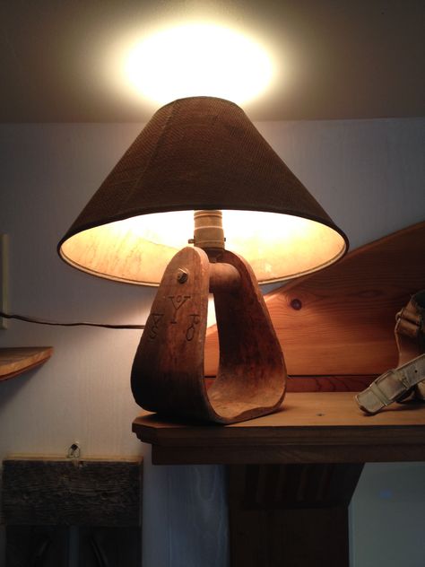 This lamp is made from an old stirrup and is located in the Pony Espresso. Western Lamp, Old West Decor, Western Lamps, Barn Ideas, Small Projects, Vintage Interior, Lamp Base, Old West, Lamp Bases