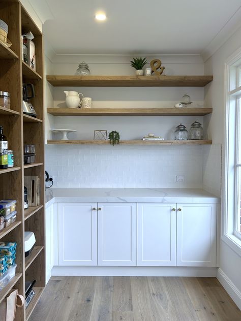 Custom designed and manufactured walk in pantry, with 16mm thick lamiwood open adjustable shelves and 'shaker' poly doors. 55mm thick floating lamiwood shelves. #wip #butlerspantry #butlerspantryideas #butlerspantrygoals #butlerspantryinspo #kbecastlehill #kitchensbyemanuel #custombutlerspantry #pantryinspo #custompantry #customstoragespace #openshelving #kitchenideas #walkinpantrydesign #walkinpantrygoals Butlers Pantry Open Shelves, Butlers Pantry Floating Shelves, Pantry With Wood Shelves, Butler Pantry Door, Walk In Pantry Storage, Bar In Pantry, Diy Butlers Pantry, Floating Shelves Pantry, Kitchen Wall Pantry