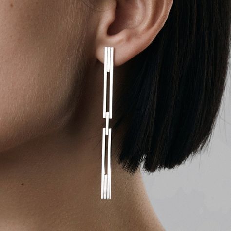 Minimal and elegant with a contemporary twist in design. New member to CONCORD family. This earring is designed to be worn in couple different ways. Made with secure closure on the bottom part it can be bend via hinge and close from the back of the ear. It can also have a more elegant version, when worn open and secured with standard silver earrings nut. You can choose to wear it as one or as a pair, please find more ways to style "aka jewellery" and share it with us! MATERIAL: - Available in si Architectural Earrings, Metal Art Jewelry, Contemporary Jewellery Designers, Metalwork Jewelry, Silver Statement Earrings, Contemporary Earrings, Art Jewelry Contemporary, Minimalist Studs, Classic Earrings