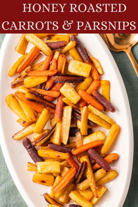 These honey roasted carrots and parsnips are simple to prepare and are ready in about 30 minutes. These veggies taste fantastic with both a sweet and savory flavor.  The flavor combinations in this vegetable recipe can be described as sweet, savory, fresh, herbal and earthy. It may seem unusual to pour a syrupy sweet mixture over vegetables but it is a deliciously indulgent treat for a special meal. Honey Roasted Parsnips, Carrots And Parsnips, Roasted Carrots And Parsnips, Roasted Parsnips, Honey Roasted Carrots, Vegetable Recipe, Flavor Combinations, Rainbow Carrots, Lemon Pepper Chicken