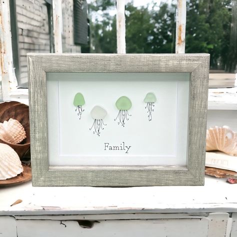 Sea Glass Art Family Present| Friendship Seaglass Jellyfish Framed Art Gift This Listing Includes: *Beautiful Sea Glass Art As Pictured *Genuine Sea Glass Used In Each Piece *Perfect Gift For A Birthday Or Holiday! *Original Minimalist Design Printed On Card Stock Paper With Sea Glass Attached * High Quality 5x7 Compostite Shadowbox Frame *Real Glass Front *Frame Available In Wood Grain, White Or Black *Bevel Cut Mat *Frame Depth Is 1.5 Inches And Stands Alone Or Can Be Hung *Note Included About Unique Jellyfish, Sea Glass Wedding, Sea Glass Artwork, Sea Glass Art Diy, Sea Glass Art Projects, Beach Glass Crafts, Present For Birthday, Jellyfish Art, Family Presents