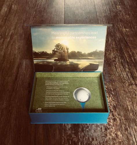 Hole-in-one! This bespoke Presentation Box for DLL hits the spot when it comes to an engaging and memorable creative marketing solution.  Created as a luxury golf experience invitation to a VIP event the recipient can read about the experience ahead and receive a branded golf ball which was set in a bespoke foam fitment.  #Presentationbox #FuseInnovation #DLL #creativemarketing #creativepackaging #creativecommunications #marketingproducts #physicalmarketing #luxuryinvitations #bespokeinvitations Golf Invitation Design, Golf Package Design, Golf Ball Packaging, Golf Packaging, Golf Invite, Golf Marketing, Work Event Ideas, Cinema Idea, Golf Theme Party