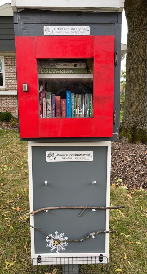 Little book library with a space below for dogs to take or leave a stick. Stick Library For Dogs, Senior Project, Free Library, Then And Now, Front Yard, Locker Storage, The Neighbourhood, Books