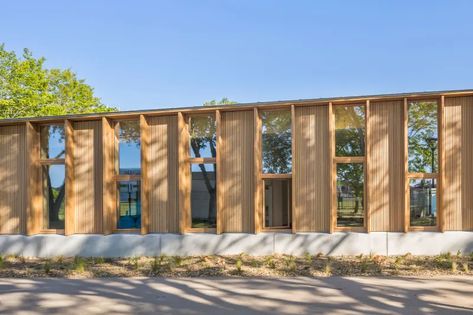 Hesters Oyon Architectes, Sergio Grazia · Grandes Terres primary school at Conflans-Sainte-Honorine · Divisare Larch Cladding, Wood Facade, Wooden Facade, Timber Roof, Peter Zumthor, Urban Agriculture, Recreation Centers, Lake Art, Cultural Architecture