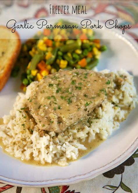 {Freezer Meal} Garlic Parmesan Pork Chops - SO delicious!!! Pork chops slow cooked in garlic seasoning, onion flakes, cream of chicken soup and apple juice. Seriously the most delicious pork chops we've ever eaten!! Can cook frozen in the slow cooker. #porkchops #slowcooker #freezermeal Garlic Parmesan Pork Chops, Parmesan Pork Chops, Crock Pot Freezer, Freezer Meal Prep, Plain Chicken, Boneless Pork Chops, Freezer Meal, Pork Chop, Crock Pot Cooking