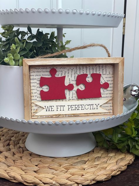 This wooden shadow box shows that your are each others puzzle piece. Option to sit on a shelf or tier tray OR also can also be hung.  The hanging hardware is already attached! Love inspired, this sweet sign will help showcase your treasured photos of family, friends and pets... anything you're crazy in love with. It's lovingly handmade and truly one of a kind. This listing is ready to be shipped today! Feel free to message us for any questions or concerns. Couples Signs, Scrabble Letter Crafts, Puzzle Piece Art, Puzzle Piece Crafts, Art Couples, Box Frame Art, Scrabble Art, Wooden Shadow Box, Couple Anniversary