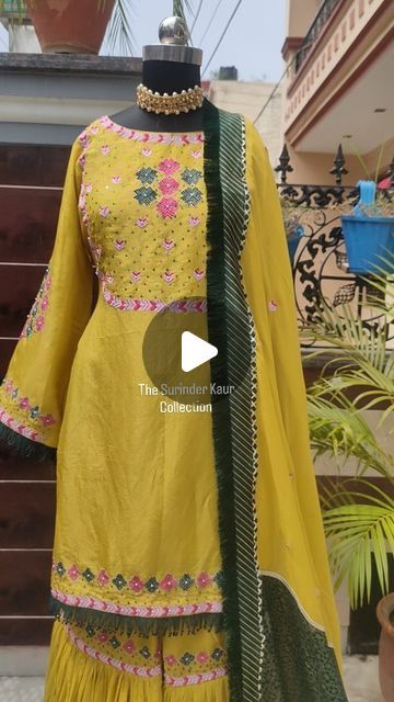 The Surinder Kaur on Instagram: "~JAGGO LOOK~
🦚 PHULKARI SUIT
Make way for the goodness this wedding season with this oh so modern yet traditional attire Brightened by zari and handwork , it give your style a traditional makeover. 
Slay in this look now 👰
For orders DM US 💛
Customizable design

.
.
.

#jaggolook
#phulkarisuit
#handwork #sequins
#patchwork #aariwork #aariworksuits
#thesurinderkaurcollection
#newpost #newcollection #punjabisuit #designersuits #latestfashion #latestdesign #trendingdesign #trendingoutfits #fashiondesigner #viral #foryou #foryoupage #new #newtrends #newyork" Traditional Attire, Punjabi Suits, Designer Suits, New Trends, Wedding Season, Latest Design, Latest Fashion, Design Trends, Good Things