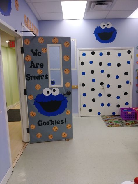 Sesame Street Classroom Door, Sesame Street Classroom Decorations, Sesame Street Door Decoration, Cookie Monster Classroom Door, Preschool Doors Ideas, Sesame Street Classroom Theme Ideas, Infant Classroom Theme Ideas Daycares, Sesame Street Bulletin Board Ideas, Sesame Street Bulletin Board