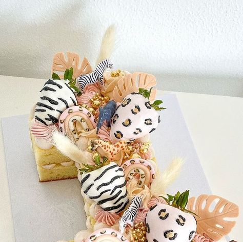 houston tx 77076 & 77093 ✨ on Instagram: "girly safari number cake 🦓🐆🩷 | loveee freestyling cakes <3 #safari #girlysafari #girlysafaricake #safaricake #birthdaycake #cakeart #chocolatestrawberries #safaristrawberries #cakeoftheday #cakesofinstagram #tallcake #fondantart #buttercream #buttercreamcake #houstoncakes #cakesofhouston #cakesdaily #cakedecorating #trendycakes #baker #cake #houstontx #madewithlove" Safari Number Cake, Number 1 Birthday Cake, Wild Birthday Party, Safari Cakes, Baker Cake, Tall Cakes, 2nd Birthday Party Themes, Number Cake, 1 Birthday