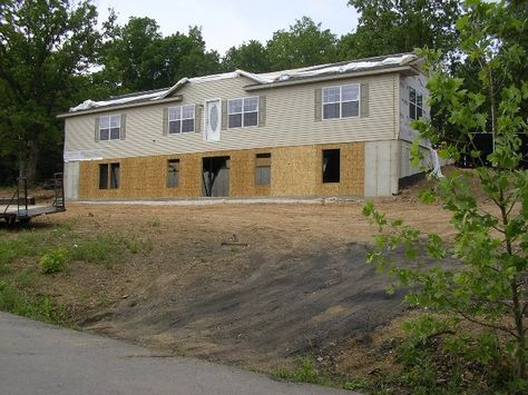 Basement mobile home Basement Under Mobile Home, Mobile Home With Basement, Mobile Home Basement, Mobile Home Garage Addition, 2 Story Mobile Home, Mobile Home Addition, Doublewide Mobile Home With Garage, Single Wide Remodel, Mobile Home Redo