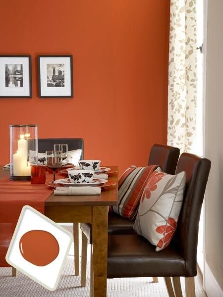 This caramelized shade—as warm as red but less expected—is a great update for a traditional dining set but works equally well with more modern, clean-lined pieces. For a similar look, try Behr Summer Heat. | Photo: Mark Scott/Ideal Home/IPC+ Syndication | thisoldhouse.com Orange Dining Room, Red Dining Room, Orange Rooms, Dining Room Colors, Orange Walls, Red Rooms, Design Del Prodotto, Red Walls, Room Interior Design