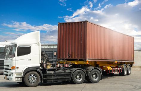 Premium Photo | Trailer truck with cargo container parking at blue sky industry freight truck transportation Logistics Network, Freight Truck, Logistics Management, Cargo Container, Cargo Services, Road Transport, Trailer Truck, Transport Companies, Trucking Companies