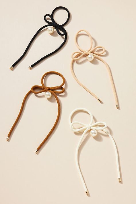 Set of four Elastic, nylon, plastic, copper Imported | Skinny Bow Hair Ties, Set of 4 by Anthropologie in Beige, Women's, Nylon/Plastic Cute Hair Ties, Satin Pj Set, Breast Tape Lift, Elastic Hair Ties, Elegant Dresses Long, Pearl Hair, Bow Hair, New Jewelry, Scrunchie Hairstyles