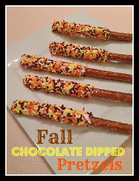 fall themed chocolate dipped pretzel rods Fall Dipped Pretzels, Fall Dipped Pretzel Rods, Pretzel Rods Dipped Thanksgiving, Halloween Pretzel Sticks Dipped, Thanksgiving Pretzel Rods, Fall Themed Pretzel Rods, Fall Pretzel Rods, Chocolate Dipped Pretzels Fall, Chocolate Dipped Pretzels Halloween