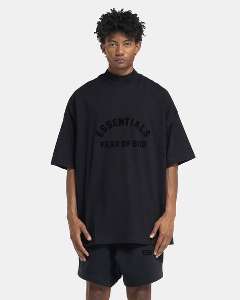 Fear of God Essentials Tee in BlackThe Essentials Tee has been redesigned in a soft cotton jersey with spacious drop-shoulder drape for an updated boxy silhouette. A revised rib-knit collar sits snugly at a higher neckline, and a new soft-touch rubberized Essentials logo adorns the front while the iconic rubberized logo patch remains at the back collar. 100% Cotton. Made in China. Hand wash cold, hang to dry. 125SP232000F. Please note that all ESSENTIALS orders are FINAL SALE. All orders are not Essentials Logo, Boys Fits, Fear Of God Essentials, Our Legacy, Fear Of God, Dries Van Noten, Knit Collar, Jil Sander, High Neckline