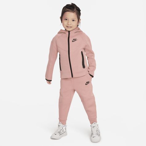 Made of bonded jersey knit fabric, this 2-piece set is inspired by the classic warmup suit. The hoodie has a full-zip closure that makes layering easy, and the matching tapered pants have ribbed cuffs and an elasticized waistband for a comfy fit the smallest athletes can play freely in. Baby Nike Tech, Toddler Nike Tech, Nike Baby Girl Outfits, Baby Girl Nike Sets, Toddler Nike Hoodie, Daughter Style, Jordan Shop, Nike Sportswear Tech Fleece, Kids Sportswear