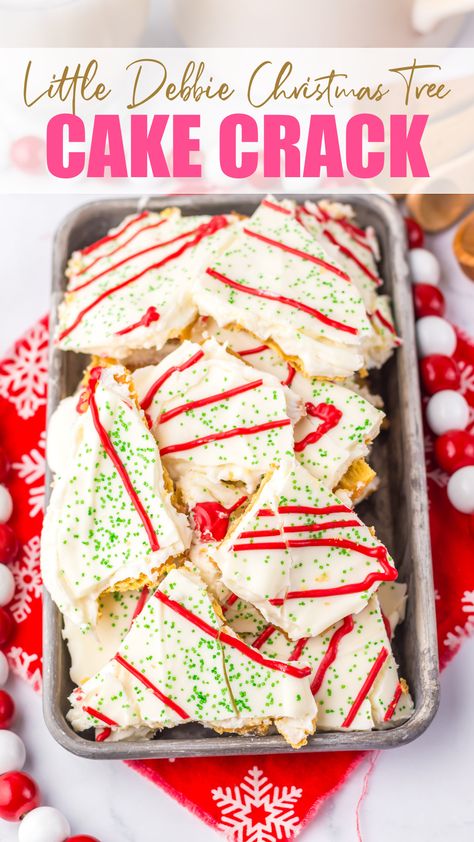 a tray of Christmas Tree Cake Crack Red Lobster Biscuit Mix, Little Debbie Snack Cakes, Sour Cream Biscuits, Christmas Tree Desserts, Little Debbie Christmas Tree, Debbie Snacks, Saltine Toffee, Christmas Tree Food, Cake Dip