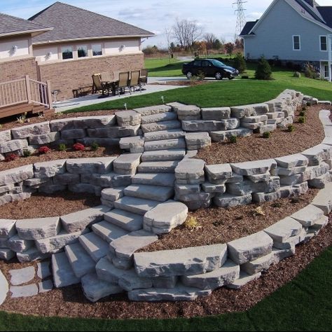 Michigan Landscaping, Backyard Retaining Walls, Sloped Backyard Landscaping, Terraced Landscaping, Sloped Yard, Stone Steps, Sloped Backyard, Landscaping Retaining Walls, Hillside Landscaping