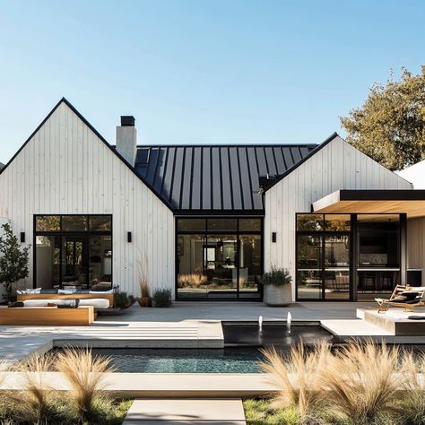 Black Metal Windows Exterior, White House Black Metal Roof, Old House Renovation Exterior, Black And White Beach House, Industrial Style House, Cozy Beach House, Black Metal Roof, Modern Window Design, Secret Hideout