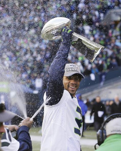 Seattle Seahawks quarterback Russell Wilson celebrating Super Bowl victory | 2014 Seattle Seahawks Wallpaper, Russell Wilson Seahawks, Doug Baldwin, Seahawks Super Bowl, Seahawks Outfits, Nfl Flag, Nfl Seahawks, 12th Man Seahawks, Seattle Seahawks Football