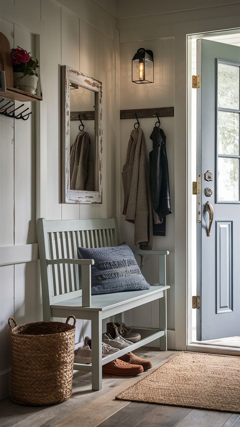 Welcome guests into your home with this beautifully styled entryway featuring a Shaker style bench, perfect for sitting and removing shoes. The woven basket adds a touch of practicality for storage, while the coat rack with hooks keeps outerwear organized. A distressed frame mirror enhances the charm and personality of the space, complemented by soft lighting from a wall-mounted lantern that creates an inviting atmosphere. Discover how to blend functionality with style in your own entryway! Click to explore more ideas! #EntrywayDecor #HomeStyling #IKEAInspo #ShakerStyle #FunctionalDesign #CozyHome #InteriorInspiration Entryway Mirror With Hooks And Bench, Entryway Mirror With Hooks, Cottage Entryway, Entryway Mirror, Mirror With Hooks, Extra Storage, Shaker Style, Entryway Decor, Functional Design