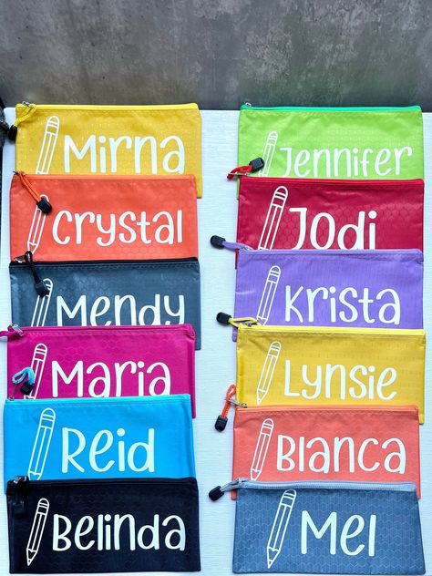 Welcome to our personalized pencil bags for kids school supplies! These customized pencil pouches are the perfect custom party favors for girls birthday parties or boys birthday parties. Our pencil case is customized with a child's name and is an excellent birthday favor idea.  Children would love to receive this supply bag as a favor gift from a friend! With their durable construction and versatile usage, they are also perfect for office or school supplies, cosmetics, tools, checks, receipts, a Pencil Pouch Diy, Pencil Pouches, Boy School, Kids Pencil Case, Kids School Supplies, Custom Gift Bags, Custom Party Favors, Personalized Pencils, School Supply