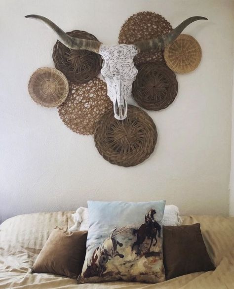 Steer Skull Wall Decor, Boho Native American Decor Living Rooms, Long Horn Skull Decor Living Rooms, Western Boho Accent Wall, Boho Skull Decor, Western Chic House Decor, Bull Skull Wall Decor, Diy Western Decor Living Room, How To Hang A Cowhide On The Wall