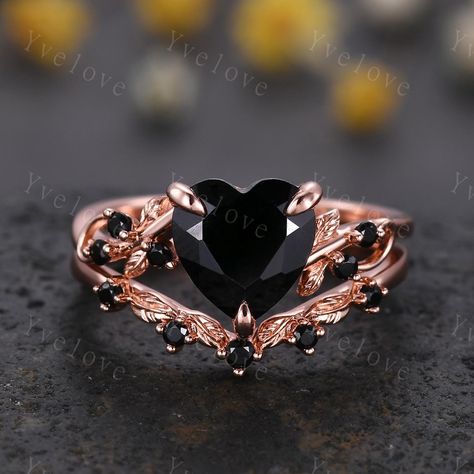 8 mm Heart Shape Black Onyx Ring,Vintage Twig Vine Leaf Ring,Antique Black Onyx Bridal Promise Ring Set Nature Inspired 14K Rose Gold band,Customized,Gift For Her,Christmas Ring gift,wedding gift Material:925 Sterling Silver,Black/Rose/White/Yellow Gold Plated             Solid gold (10k 14k 18k black gold, rose gold,yellow gold,white gold,Platinum available) Main stone:8mm heart cut natural black onyx stone Stones: Natural round cut Black spinel stone Band width:approx 1.5 Setting:prongs  set Matching band: Stone:with Natural round cut Black spinel stone Band width:approx 1.3 Setting:prongs set Our Service: All sizes available,please feel free to contact me if you need another ring sizes. Craft Period:Because all of rings are handmade to orders,it takes about 13-15 business days to make ( Rose Gold Black Ring, Onyx Promise Ring, Goth Wedding Ring Set, Black And Pink Wedding Rings, Wedding Ring Gothic, Black Diamond Engagement Ring Gold, Black And Rose Gold Ring, Halloween Wedding Rings, Black Engagement Rings