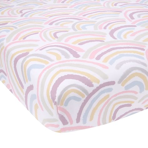 PRICES MAY VARY. 100% Certified Organic Breathable Cotton Trendy hand drawn colorful rainbow pattern Adds the perfect blend of style and comfort for any baby or toddler Elastic all around for a safe and secure fit on standard size crib mattresses Machine washable for easy care Add a splash of color to your child’s crib with our breathable 100% certified organic cotton rainbow fitted crib sheet. Its fully elastic perimeter provides a safe and secure fit on a standard size mattress measuring 52” x Rainbow Crib Bedding, Ivy Girl, Organic Crib Sheets, Rainbow Wall Decor, Lambs & Ivy, Baby Crib Bedding Sets, Rainbow Pastel, Baby Crib Bedding, Rainbow Nursery