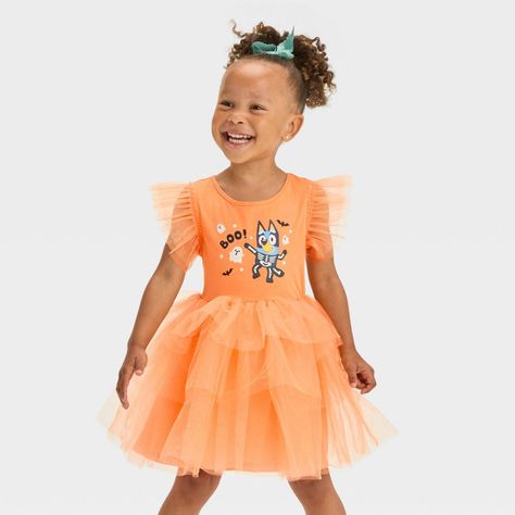 Dress up your little one for fun festive celebrations in twirl-ready style with this Halloween Bluey Dress. This orange dress framed by a round neck features fluttery mesh short sleeves, a tiered tulle skirt and a playful print of Bluey along with 'Boo' text, black bats and ghosts for a cute Halloween-inspired look. The lightweight fabric and a tagless design offers comfy wear, while the pullover style makes dressing them hassle-free. Bluey And Bingo Costume Teen, Bluey Dress, Halloween Bluey, Bluey Halloween Shirt, Bluey Dress For Girl, Long Sleeve Tulle Dress, Halloween Tutu Dress, Candy Dress, Tiered Tulle Skirt