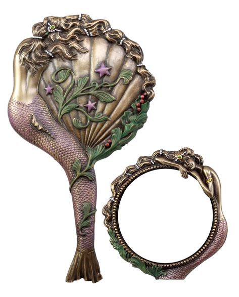 PRICES MAY VARY. This beautiful Mermaid Hand Mirror measures approximately 10.5" tall, 5.75" wide and 0.75" deep approximately. Mirror diameter 4.5" This mermaid hand mirror is made of high quality polyresin, individually hand crafted and painted. Color tone may vary from picture. Princess Aurora closes her eye for a short nap, resting on the mirror of destiny. The backside of the hand mirror outlines a beautiful scenery of the coral seashell. She will make a beautiful collection or gift for a l Mermaid Hands, Sleeping Mermaid, Mermaid Perfume, Art Nouveau Mermaid, Mermaid Mirror, Sea Maiden, Mirror Stands, Art Deco Color, Art Galleries Design