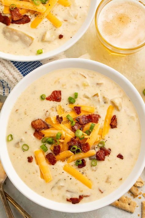 This Crockpot potato soup is rich and creamy, loaded with toppings like bacon and cheese, and is easy to make in the slow cooker! Slow Cooker Chicken Bacon And Potato Soup, Crock Pot Loaded Baked Potato Soup Easy Family Recipes, Slow Cooker Cream Of Potato Soup, Loaded Potato Soup With Heavy Cream, Whole 30 Potato Soup Crock Pot, Potato Bacon Soup Instant Pot, Cheesy Potato Bacon Soup, Loaded Crockpot Potato Soup, Loaded Potato Soup Slow Cooker