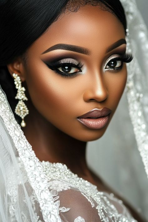 50+ dramatic bridal makeup ideas for brides who love a bold aesthetic. Featuring smoky shadows, bold eyeliner, and radiant finishes, these looks will elevate your bridal style. Ready to make a statement? Explore the collection for all the glamorous details. #makeuplooks #dramaticbride #weddingdaybeauty Indian Bridal Makeup For Dark Skin, Black Bridal Makeup Dark Skin, Sultry Bridal Makeup, Black Bride Makeup Wedding, Goth Wedding Makeup, Makeup Looks Glamour, Bold Bridal Makeup, Black Bride Makeup, Dramatic Bridal Makeup