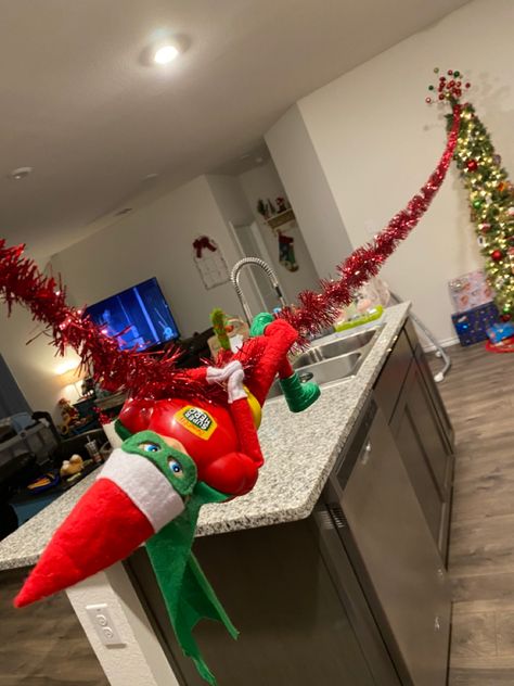 Stinky dressed as a superhero and made a zipline in the kitchen! Elf Superhero Ideas, Super Hero Elf On The Shelf Ideas, Elf On The Shelf Superhero Ideas, Elf 2023, Elf 2024, Christmas Setup, Funny Elf On The Shelf, Chirstmas Decor, Elf Dress