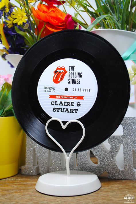 vinyl record wedding table-names retro rock n roll rolling stones Records Table Numbers, Record Centrepiece, Record Wedding Centerpieces, Rock N Roll Wedding Decorations, Begginer Workout, Creative Wedding Table Numbers, Vinyl Record Wedding, Wedding Centre Pieces, 50th Party Favors