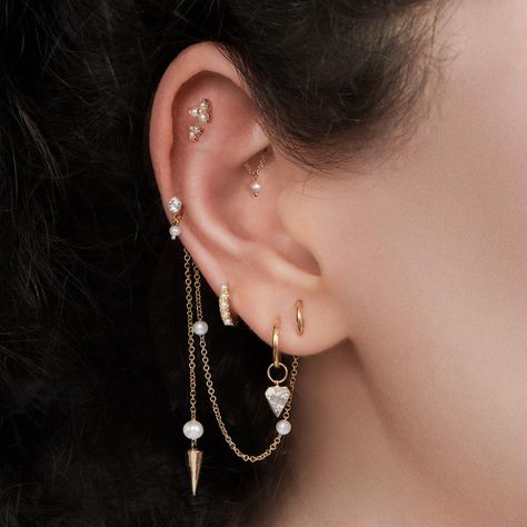 Maria Tash on Instagram: “Pearl charms and chains emerge from behind the ear, complementing the Tash Hidden Rook placement and a unique vertical Lobe orbital.” Lobe Orbital, Curated Ear, Pretty Ear Piercings, Maria Tash, Dark Days, Ear Style, Cute Piercings, Classy Jewelry, The Ear