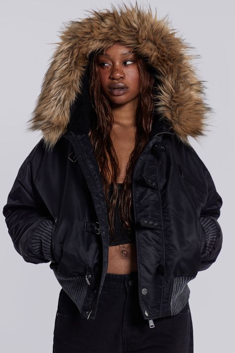 Designed in collaboration with Schott NYC, this piece is part of an ultra-limited edition. Crafted from the original Schott fabrics, it features a slightly cropped body and a faux fur trim hood for refined sophistication. Finished with distinctive details like a zip split hood, short pile borg lining, and antique silver hardware, this timeless jacket will leave its mark. Designed in collaboration with Schott NYC Very limited edition Adapted from the iconic Schott JKT51 hooded jacket Original Sch Jackets With Fur Hood, Aesthetic Winter Jacket, Pretty Jackets, Timeless Jacket, Faux Fur Outfit, Winter Jacke, Fur Hood Jacket, Black Jet, Fur Leather Jacket