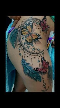 Colored Hip Tattoos Women, Dream Catcher Tattoo On Thigh, Erika Nails, Atrapasueños Tattoo, Flower Thigh Tattoos, Butterfly Tattoos For Women, Fairy Tattoo Designs, Tattoos For Women Flowers, Dream Catcher Tattoo